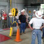 people receiving crane training
