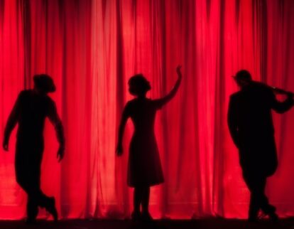 silhouette of theatre performers